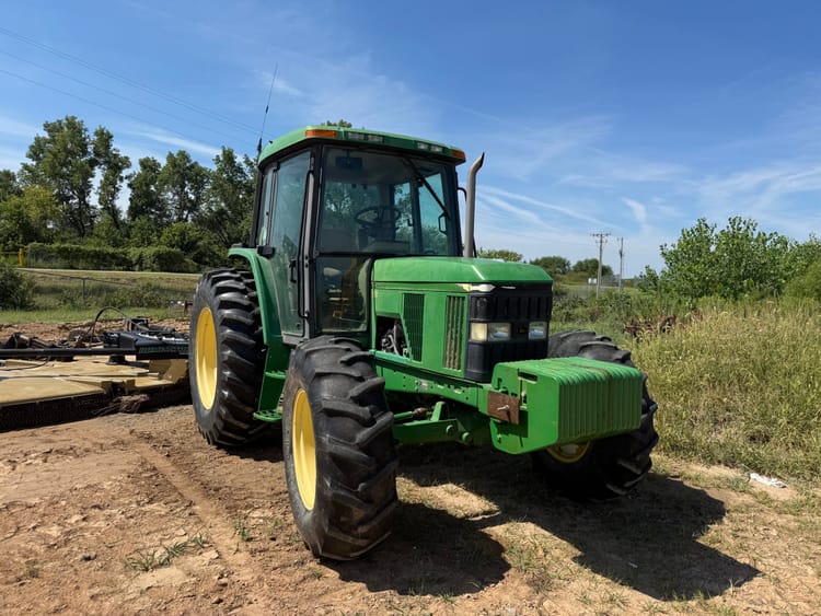 1999 JOHN DEERE 6310 TRACTOR