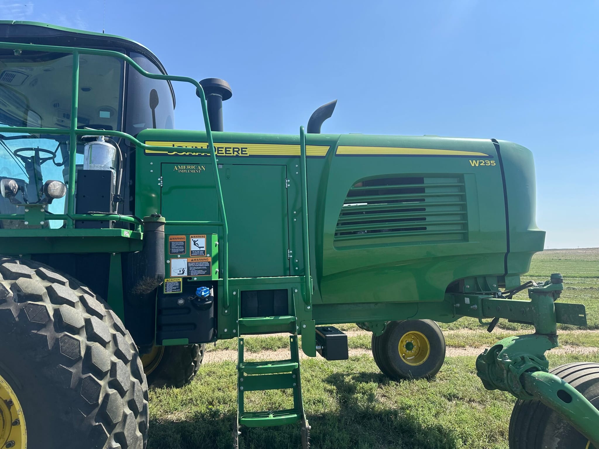 2020 JOHN DEERE W235 WINDROWER